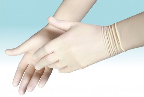 Рукавички хірургічні MEDICARE нестерильні, припудрені, розмір 7,5 по 100 штук лівої рукавички і 100 штук правої рукавички в різних коробках. 10330 фото